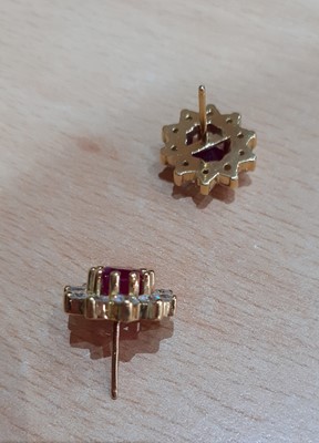 Lot 2048 - A Pair of 18 Carat Gold Ruby and Diamond...