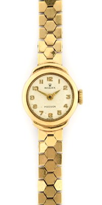 Lot 2437 - Rolex: A Lady's 9 Carat Gold Wristwatch,...