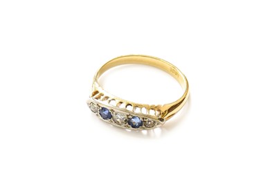 Lot 20 - A Sapphire and Diamond Five Stone Ring, three...