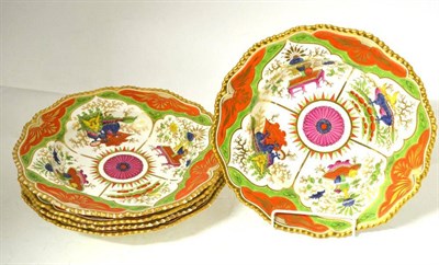 Lot 81 - A Set of Five Chamberlains Worcester Porcelain Soup Plates, circa 1810, painted with the dragons in