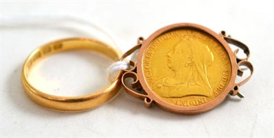 Lot 65 - An 1894 mounted half sovereign and an 18ct gold wedding band (2)