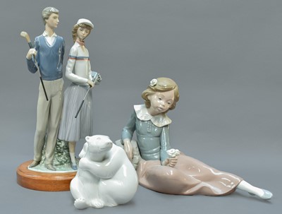 Lot 283 - A Lladro Figure Group of Golfers, 36cm high;...