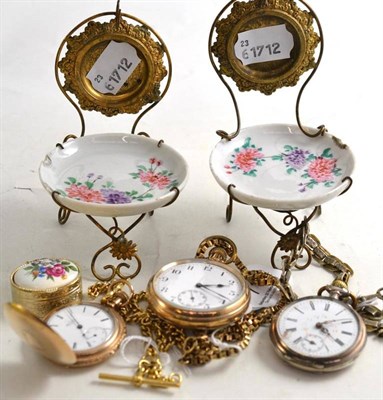 Lot 71 - Two gilt metal pocket watches, another, a pill box and two watch stands