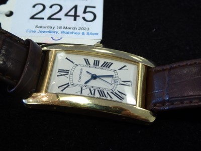 Lot 2245 - Cartier: An 18 Carat Gold Automatic Calendar...
