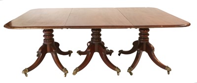 Lot 281 - A Regency Mahogany Triple-Pillar Dining Table,...