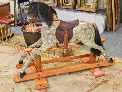 Lot 1204 - A Dapple Grey Painted Rocking Horse, on a pine...