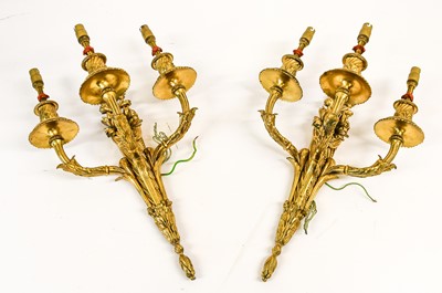 Lot 530 - A Pair of Gilt Metal Three-Light Wall Sconces,...