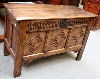 Lot 1383 - A 19th Century Three Panel Oak Coffer, carved...