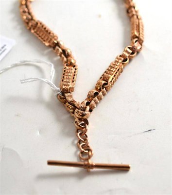Lot 94 - A 9ct rose gold star and bar Albert chain