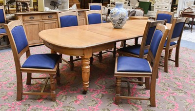 Lot 1228 - A Victorian Oak Wind Out Dining Table, with...