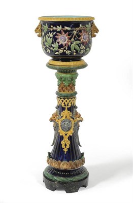 Lot 85 - An English Majolica Jardinière and Stand, circa 1870, the jardinière of baluster form with...
