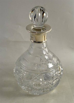 Lot 101 - Large scent bottle with stopper and silver collar