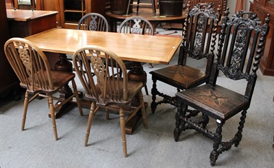 Lot 1325 - A 20th Century Oak Dining Table, with trestle...