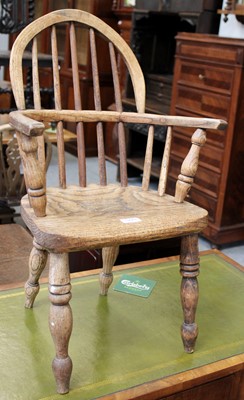 Lot 1229 - A 19th Century Elm Child's Windsor Chair