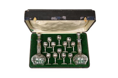 Lot 2178 - A Cased Pair of American Silver Overlay Glass Decanters and Twelve Glasses