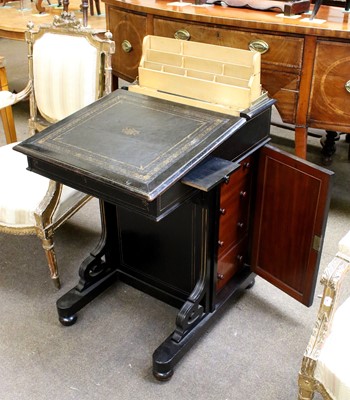 Lot 1168 - A 19th Century Ebonised Davenport, with gilt...