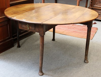 Lot 1314 - An 18th Century Oak Pad Foot Dining Table,...