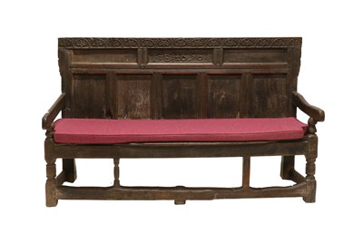 Lot 209 - A 17th Century Joined Oak Settle, dated 1696...