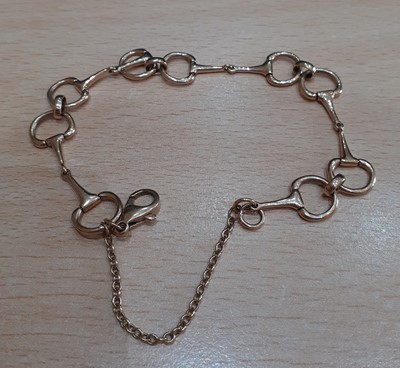 Lot 2038 - A Fancy Link Bracelet designed as yellow chain...