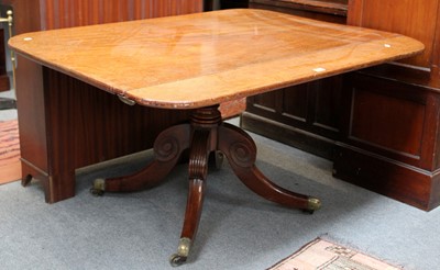 Lot 1176 - A Regency Mahogany Dining Table, of rounded...