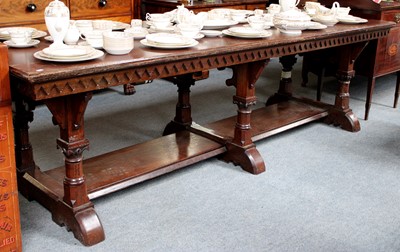 Lot 1343 - A Late Victorian Carved Oak Table, the large...