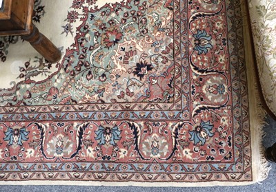 Lot 1273 - An Turkish Carpet, the ivory ground, the...