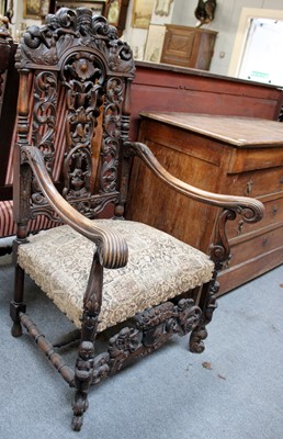 Lot 1371 - A Carolean Style Carved Oak Armchair, the...