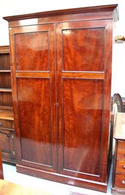 Lot 1391 - An Edwardian Mahogany Two Door Wardrobe, 131cm...