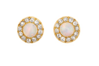 Lot 2040 - A Pair of Opal and Diamond Cluster Earrings...