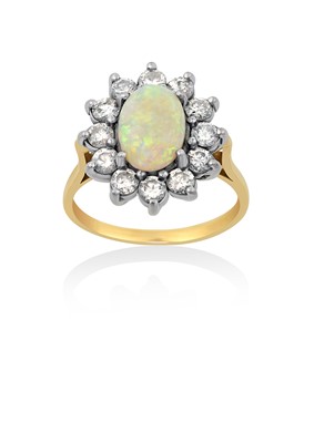 Lot 2044 - An 18 Carat Gold Opal and Diamond Cluster Ring...