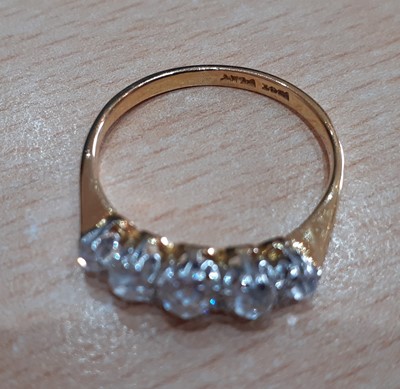 Lot 2183 - A Diamond Five Stone Ring the graduated old...