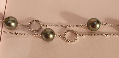 Lot 2090 - An 18 Carat White Gold Tahitian Pearl and...