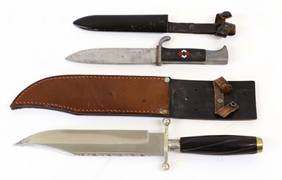 Lot 154 - A Bowie Knife, the 21.5cm clip-point scallop...
