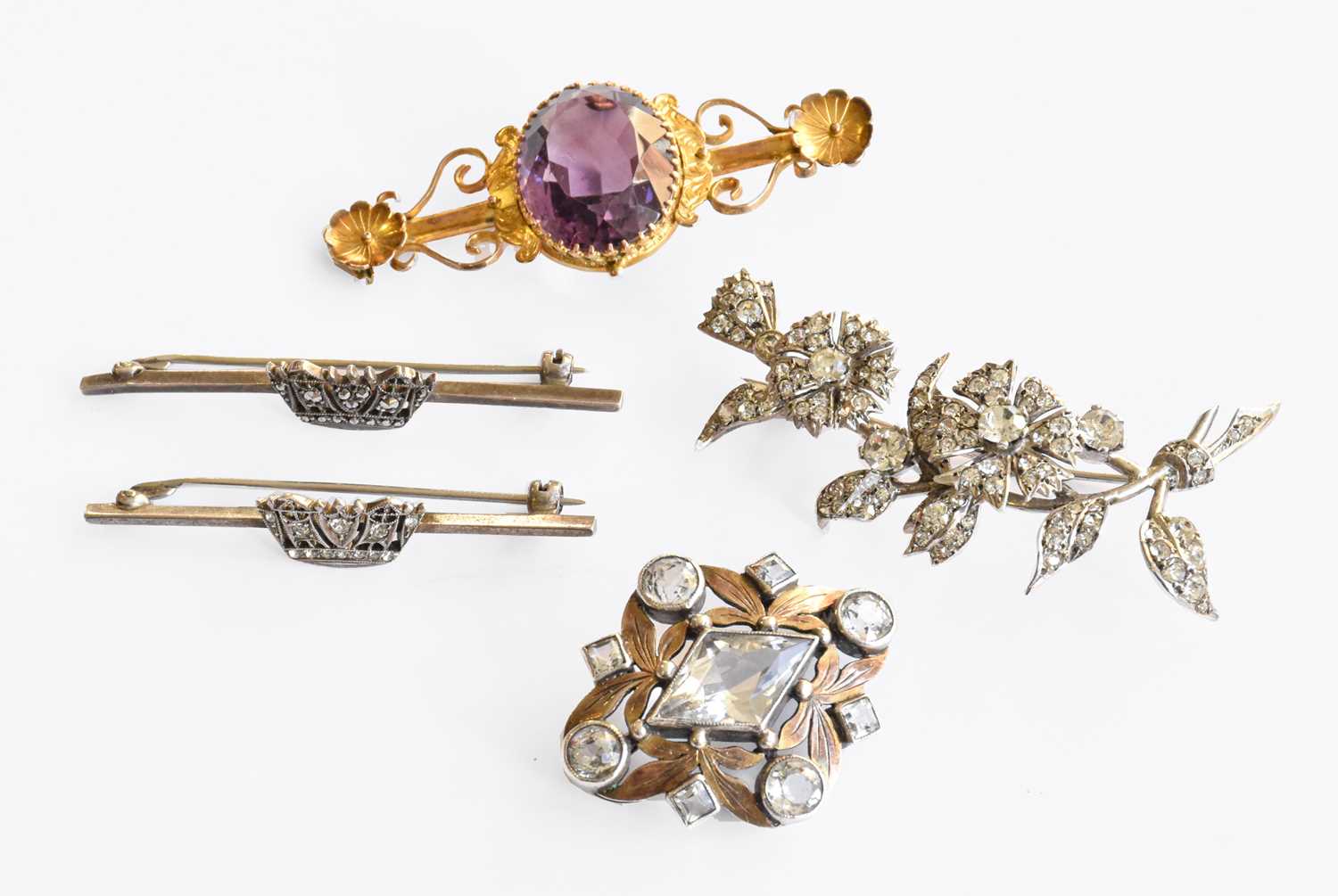 Lot 204 - Five various brooches, comprising of a paste...