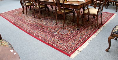 Lot 1230 - A Machine Made Carpet of Oriental Design,...