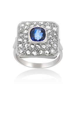 Lot 2075 - A Sapphire and Diamond Cluster Ring the square...