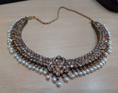 Lot 2264 - An Indian Diamond, Enamel and Pearl Necklace...