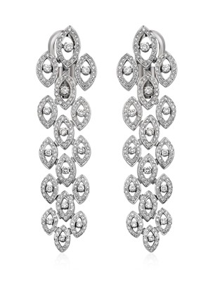 Lot 2240 - A Pair of Diamond Drop Earrings three rows of...