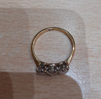 Lot 2052 - A Diamond Three Stone Ring the graduated old...