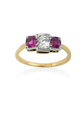 Lot 2162 - A Ruby and Diamond Three Stone Ring the old...