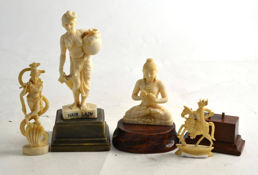 Lot 192 - An ivory Buddha, another figure 'Nair Lady' and two small carvings