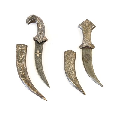 Lot 219 - Two Indian Daggers, each with damascined steel...