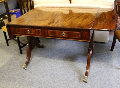 Lot 1252 - A George III Mahogany Sofa Table, with brass...