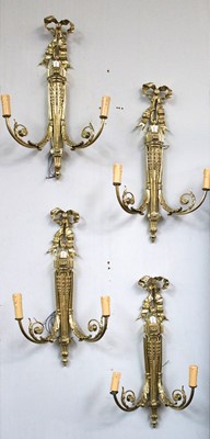 Lot 1223 - A Set of Four Gilt Metal Twin-Light Wall...