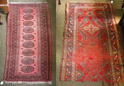 Lot 1228 - A Bukhara Style Runner, the red brick ground...