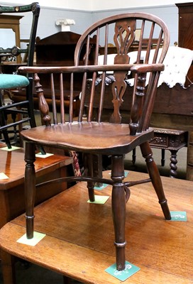 Lot 1175 - A 19th Century Yew and Elm Windsor Chair, with...