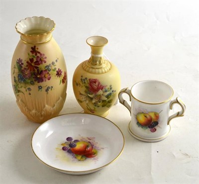 Lot 202 - Two Royal Worcester blush ivory vases and two Royal Worcester white ground fruit painted...