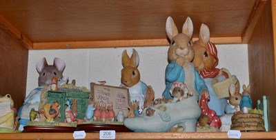 Lot 206 - Four large Border Fine Arts Beatrix Potter figure groups and six smaller groups (one shelf)