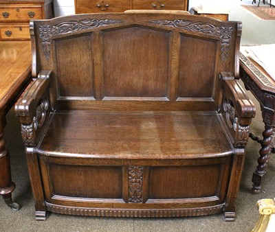 Lot 1212 - A 1920's Carved Oak Monks Bench, 121cm by 54cm...