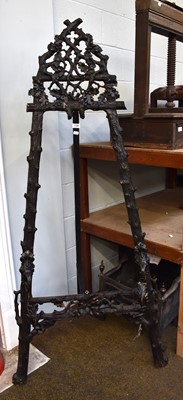 Lot 1106 - A Black Forest Carved Oak Easel, 177cm (a.f.)